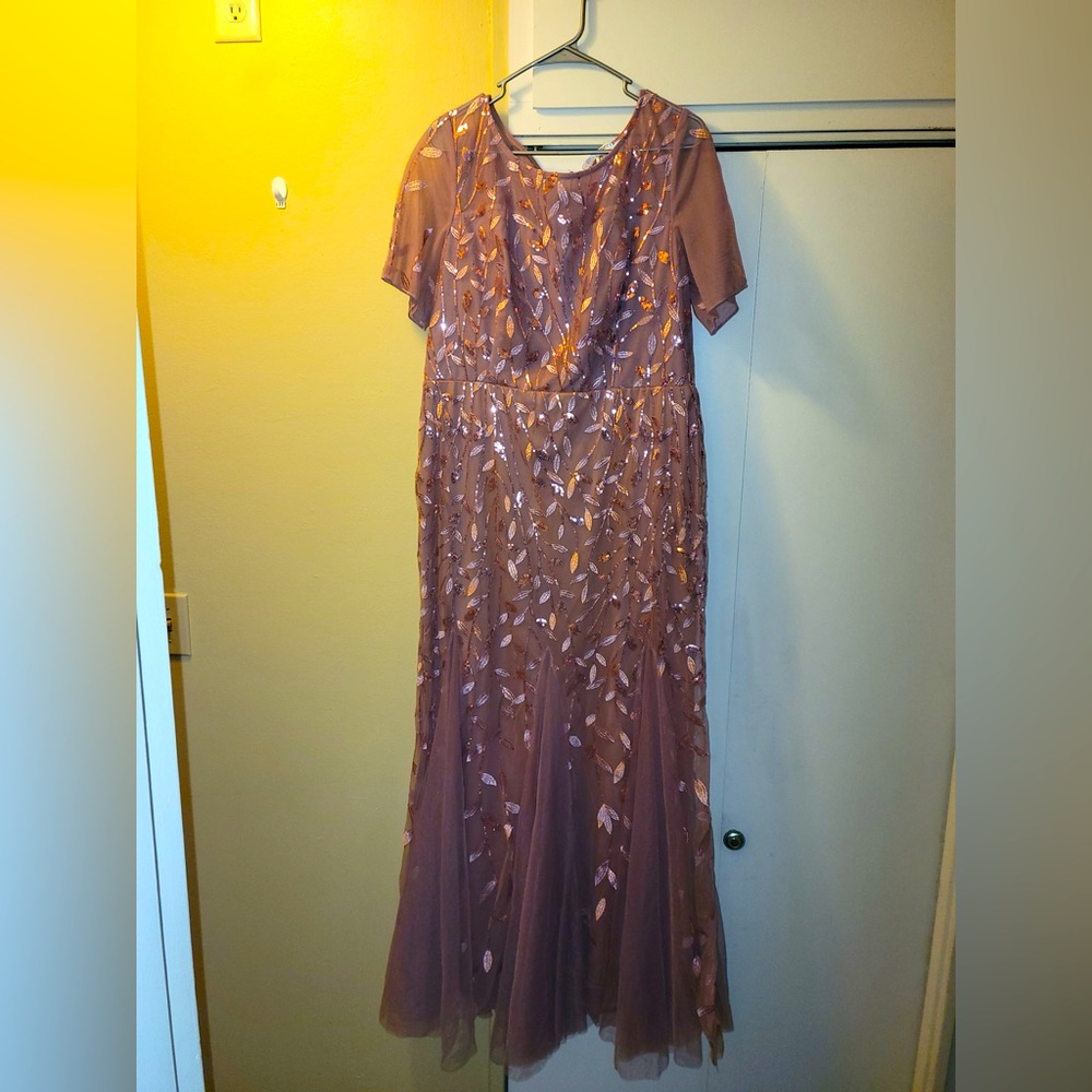 Mauve colored long dress worn one time for a wedding. Size 16.